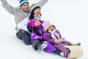 Asian family having fun in winter